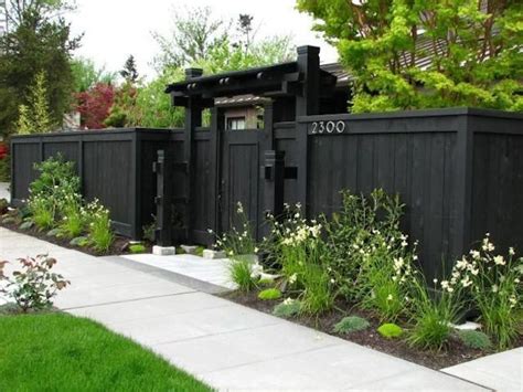 Fence. wooden privacy fence painted charcoal | Privacy fence landscaping, Backyard fences ...