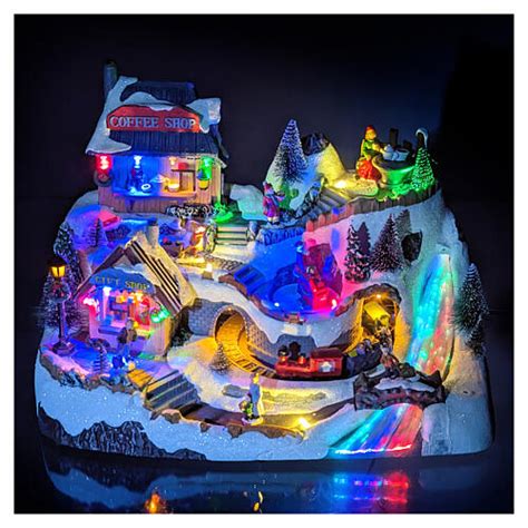 Animated Christmas village with coffee shop 25x40x25cm | online sales ...