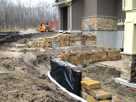 New Retaining Wall Project | Assiniboine Lights & Landscapes