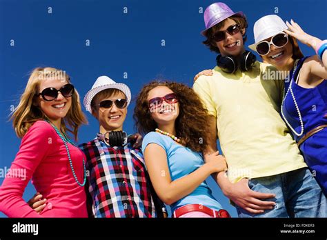 Group of young and happy people having party Stock Photo - Alamy