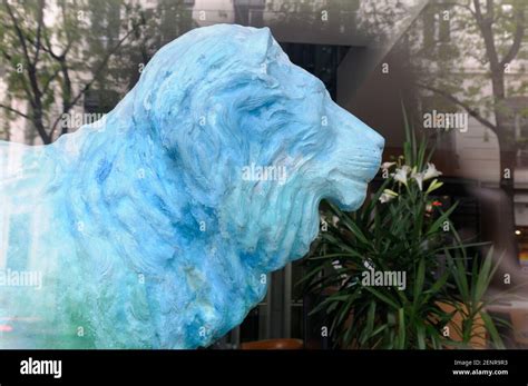 Blue lion sculpture Stock Photo - Alamy