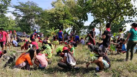 Scouts attending a camp in the Philippines take action for the ...