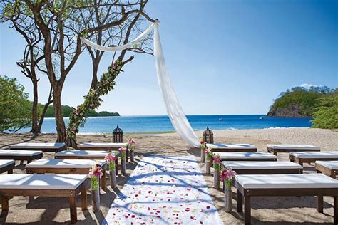 We are dreaming of this beautiful beach ceremony location at Dreams Las Mareas Resort & Spa ...