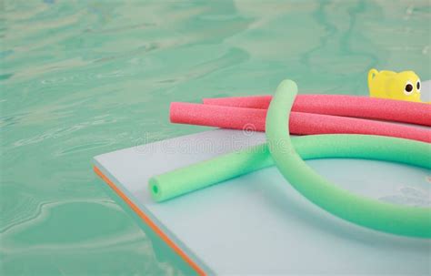 Water Aerobic Equipment. Colored Aqua Noodles in Swimming Pool Stock Photo - Image of ...