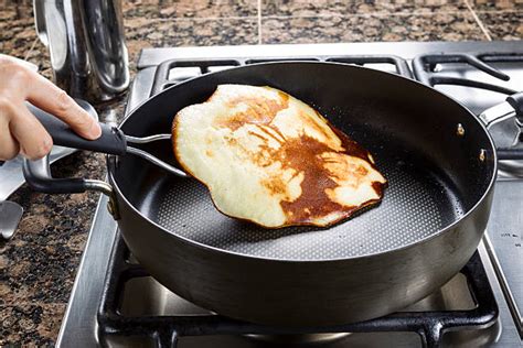 Tossing Pancakes Stock Photos, Pictures & Royalty-Free Images - iStock