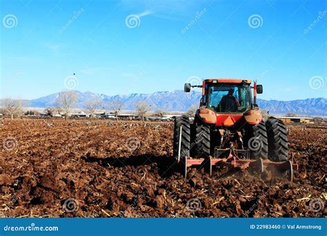 Tractor Plowing Field Stock Photo - Image: 22983460