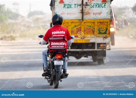 Zomato Bike Rider Delivery Boy Looking At Rider From Swiggy Food Tech Starup Apps Showing ...