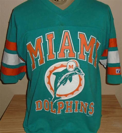 FREE Shipping vintage 1990s Miami Dolphins jersey t shirt Large by vintagerhino247 on Etsy Miami ...