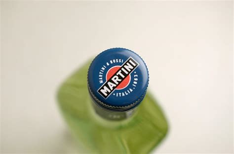 Bottle of Vermouth Martini Rossi close up logo on beige wall background 31235334 Stock Photo at ...