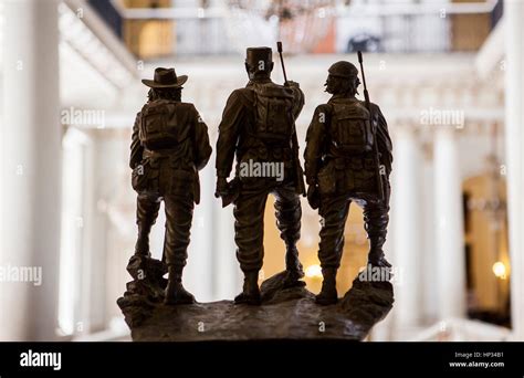 Statue depicting at Fidel Castro, Camilo Cienfuegos and Che Guevara, in Museum of the Revolution ...