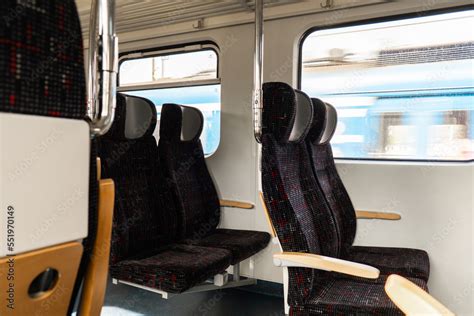 View on railroad track from the window of fast train. Interior view at ...