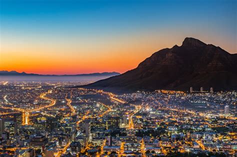 View of Table Mountain and Cape Town City at sunrise on a beautiful ...