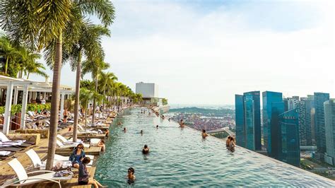 The Infinity pool at Marina Bay Sands SkyPark overlooking the Singapore ...