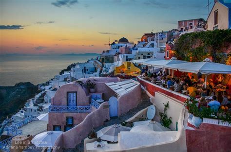 Restaurants are full in Oia in the evening