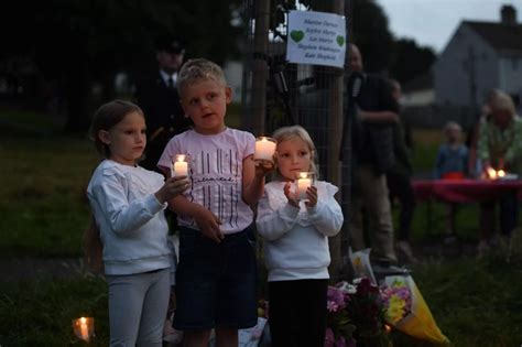 Plymouth shooting vigil: Photos show how hundreds gathered to pay tribute to victims ...