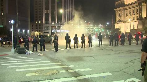 PHOTOS: Police & protesters clash in downtown Detroit on Friday night