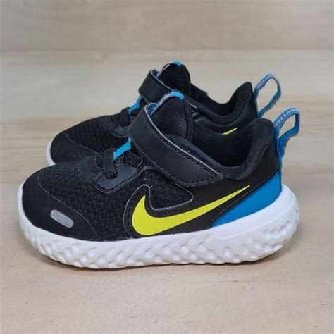 Nike Revolution 5 Kids Unisex Black Blue Sneakers... - Depop