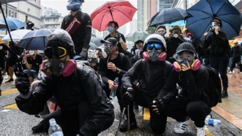 Hong Kong to ban face masks in protest crackdown: reports | Borneo Post ...