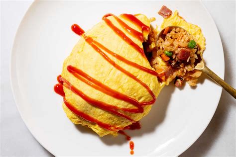 Omurice, a beloved staple of Japanese home cooking, is a linguistic and literal mash-up of ...