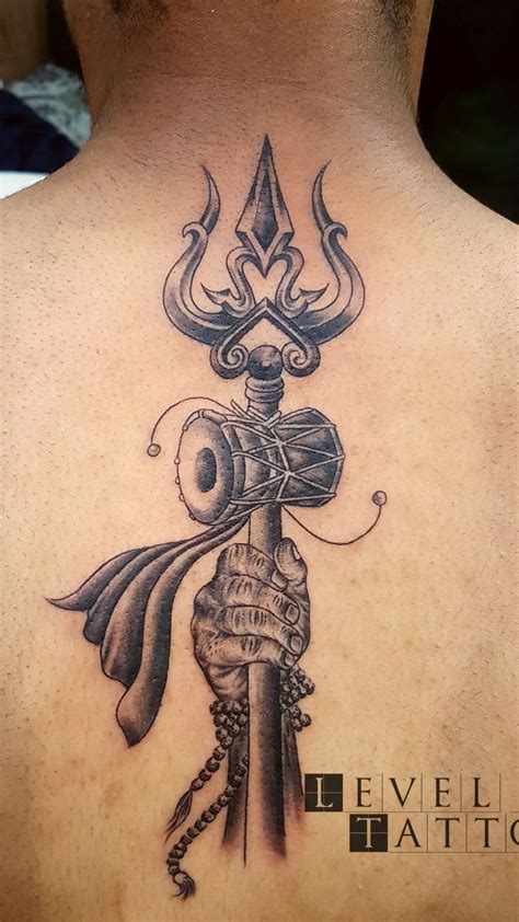 Trishul tattoo done by Billu tattoo at level ink tattoos | Shiva tattoo design, Trishul tattoo ...