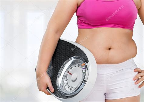 Fat female belly and scale — Stock Photo © billiondigital #118714262