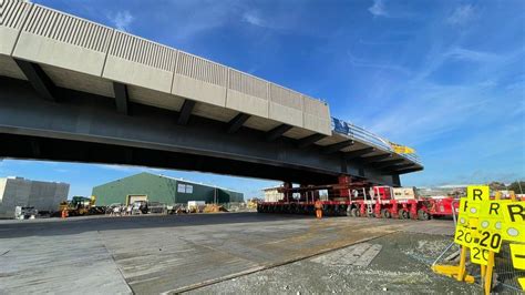 First piece of Lowestoft's Gull Wing Bridge being moved into place - BBC News