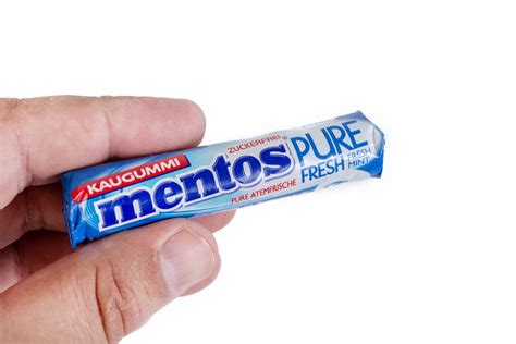 Mentos Chewing Gums plastic box above white background - Creative ...