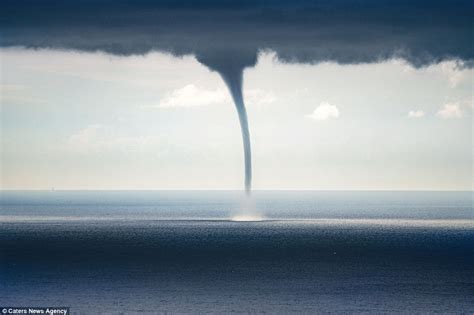 Video of a giant waterspout twister descending on Italian coastal town of Genoa | Daily Mail Online