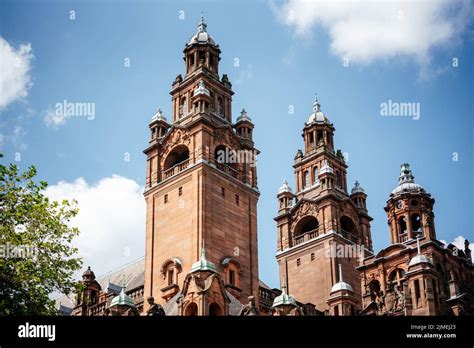 Beautiful architecture of the towers of Kelvingrove Museum against blue ...