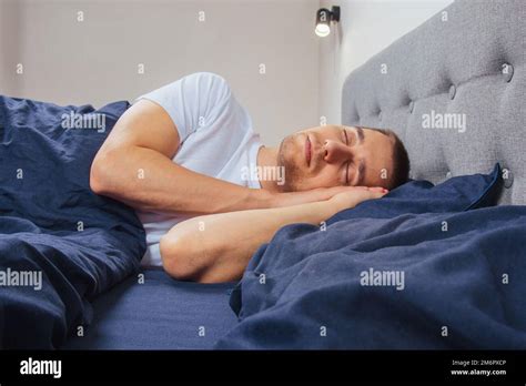 Sleeping positions man hi-res stock photography and images - Alamy