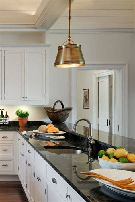 Shaker White Cabinets Glossy Black Granite Countertops Dark Hardwood ...