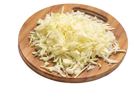 Grated cheese on a white kitchen Board - Creative Commons Bilder