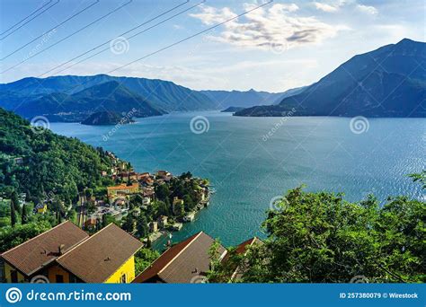 Aerial View of the Buildings on the Coasts of Lake Como Under the Blue Sky Stock Image - Image ...