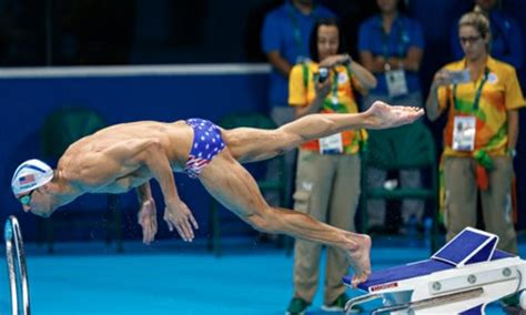 Michael Phelps takes the plunge at Rio 2016 in his first training ...