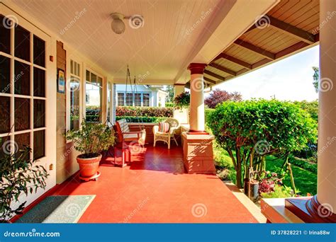 Beautiful Column Porch with Swing Stock Image - Image of residential, green: 37828221
