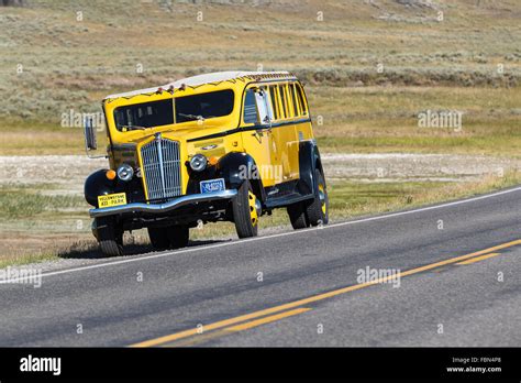 A Yellowstone shuttle bus by Hayden Valley, Yellowstone National Park, Wyoming, United States of ...