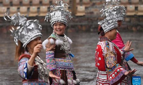 Tourists experience charm of ethnic culture in S China's Guangxi - Global Times