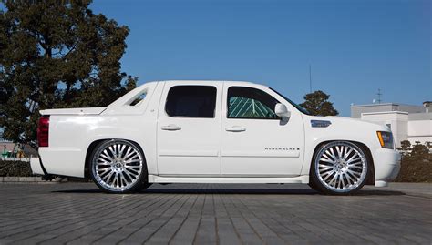 Snow White Chevy Avalanche on Lexani Chrome Wheels — CARiD.com Gallery