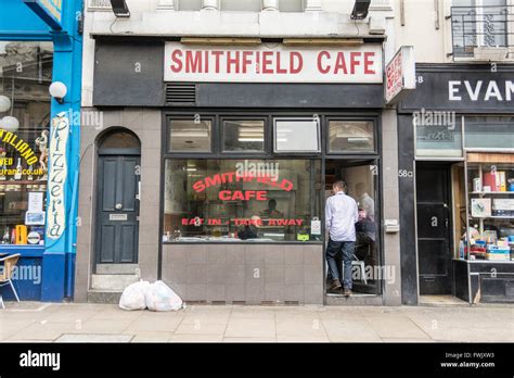 A man enters the Smithfield Cafe in Smithfield Central London, UK Stock ...