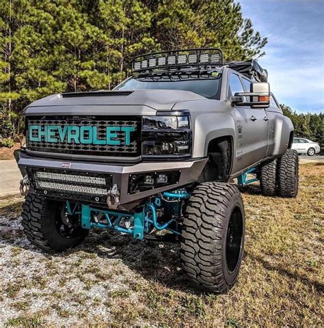 jacked up trucks mudding #Jackeduptrucks Custom Lifted Trucks, Dually Trucks, Lifted Chevy ...