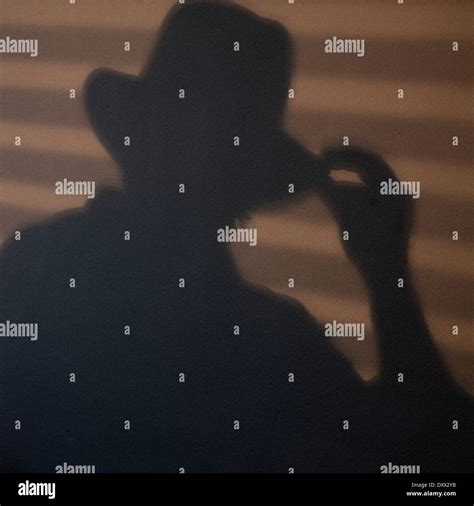 shadow of man with hat Stock Photo - Alamy