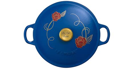 Le Creuset has a "Beauty and the Beast" themed pot and it's glorious ...