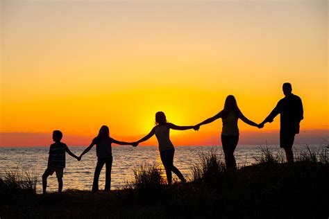 Family silhouette on the beach | Sunrise beach, Family hug, Beach