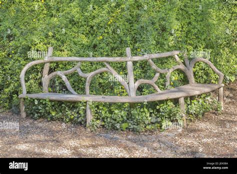 Original Crafted Wooden Chair in Park Stock Photo - Alamy