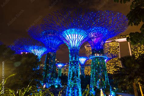 Gardens by the Bay and Marina Bay Sands Hotel Stock Photo | Adobe Stock