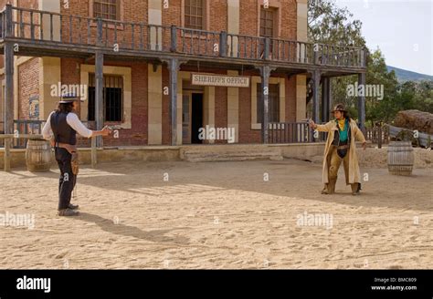 Cowboy shootout with a sheriff in the old west film set Stock Photo - Alamy