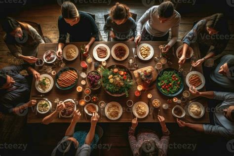 Family praying before dinner in thanksgiving dinner. ai generated ...