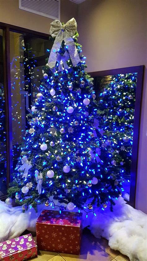 Christmas Tree with blue lights and white ornaments | Purple christmas tree, Blue christmas tree ...