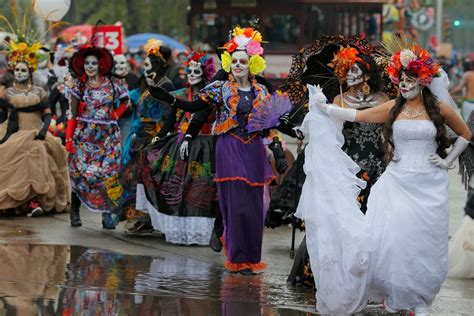 Skulls, masks and dancers as Mexico fetes Day of the Dead