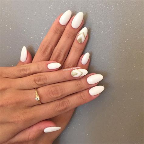 gold-and-white-almond-shaped-nail-designs | Oval nails, White almond nails, Metallic nails